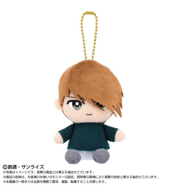 可愛Q版多諾華·巴頓坐姿毛絨公仔吉祥物,帶有金色珠鏈。