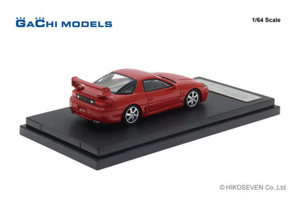 1/64 三菱 GTO (1998) 熱情紅模型車，展示於黑色底座上。