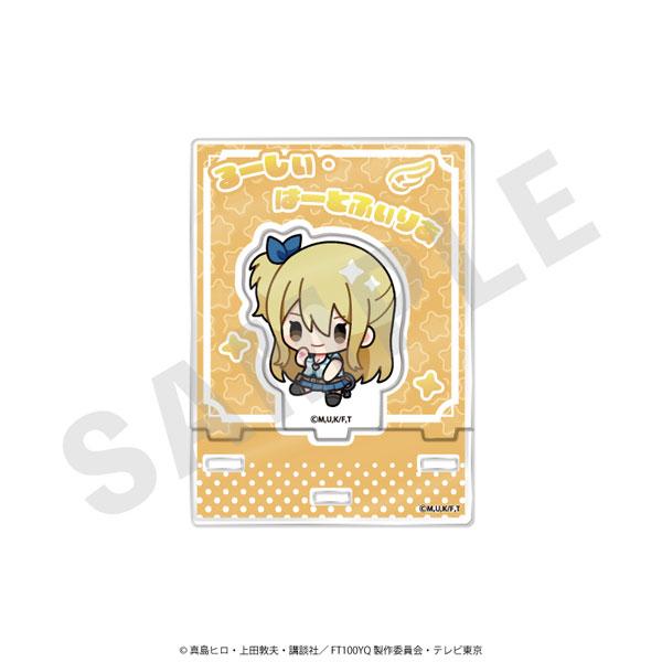 [預訂] 「FAIRY TAIL 魔導少年 100年任務」露西立牌，Q版卡通風格，黃色背景。